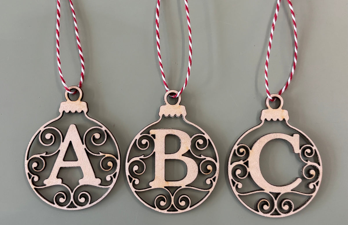 Initial swirl bauble wooden decoration