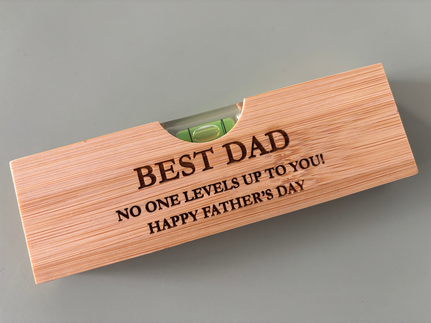 Dad spirit level with bottle opener £3 each when bought in bulk