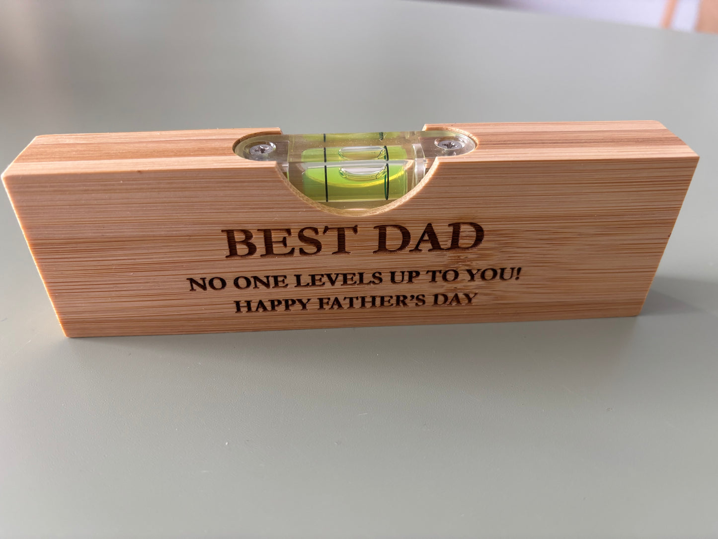 Dad spirit level with bottle opener £3 each when bought in bulk
